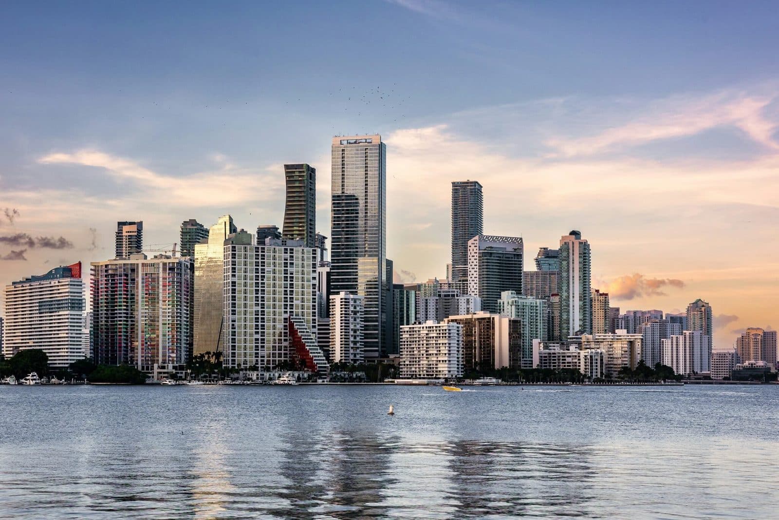 The Brickell and downtown Miami skyline over Biscayne Bay at sunset at the start of a busy news week in South Florida.