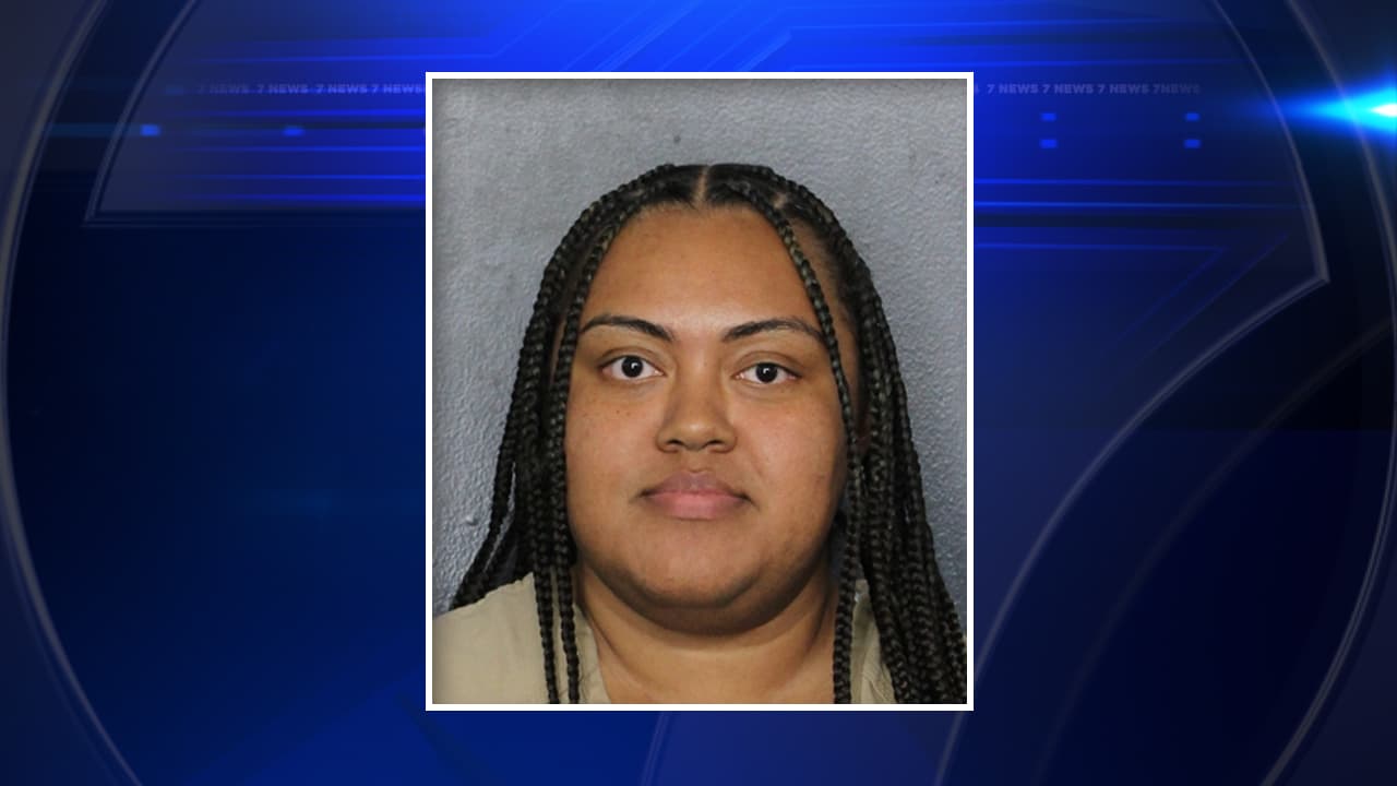 Woman arrested after dog found dead tied to fence for days without food and water